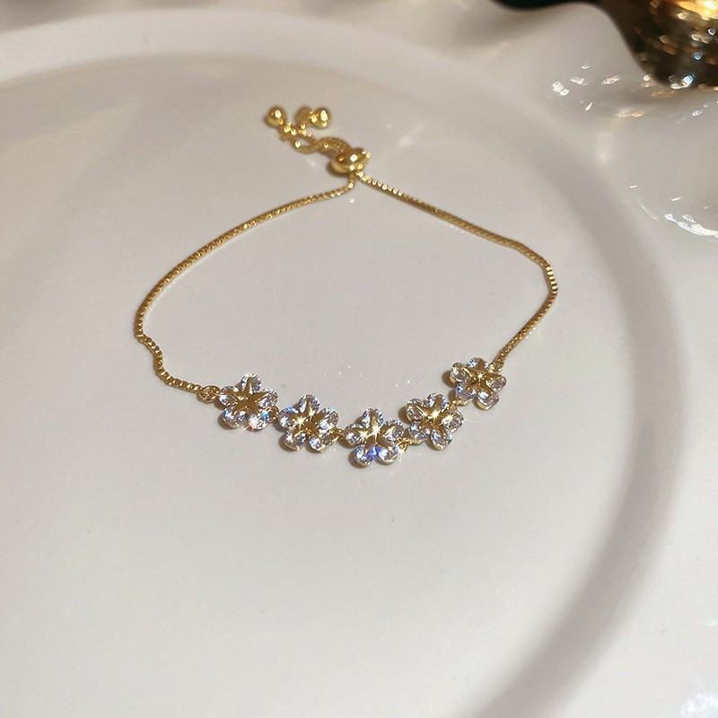 Golden bracelet, flowered