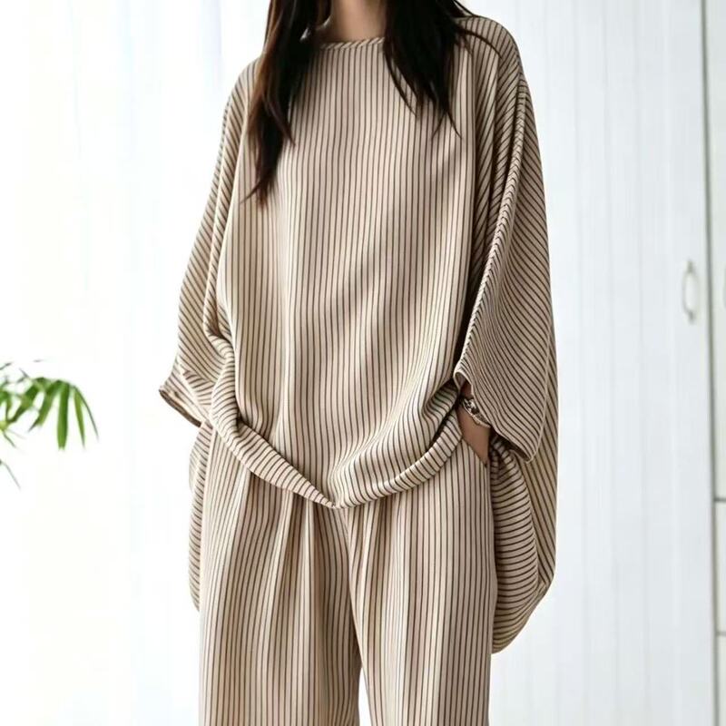 New double-pocket batwing-sleeve pajama set for women, featuring a Chinese-style design, loose fit, breathable fabric, and suitable for both indoor and outdoor wear in spring and autumn New double-pocket batwing-sleeve pajama set for women, featuring a Chinese-style design, loose fit, breathable fabric, and suitable for both indoor and outdoor wear in spring and autumn