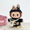 Striped buttoned sweater black + black cuffed hat + white B bag