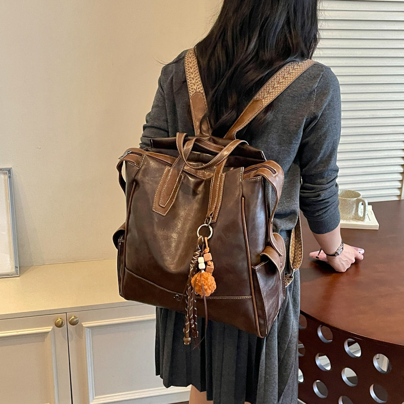 Colegio mochila coreana de gran capacidad 2026 sensación diaria de viaje retro mochila de estilo nuevo estilo mujer