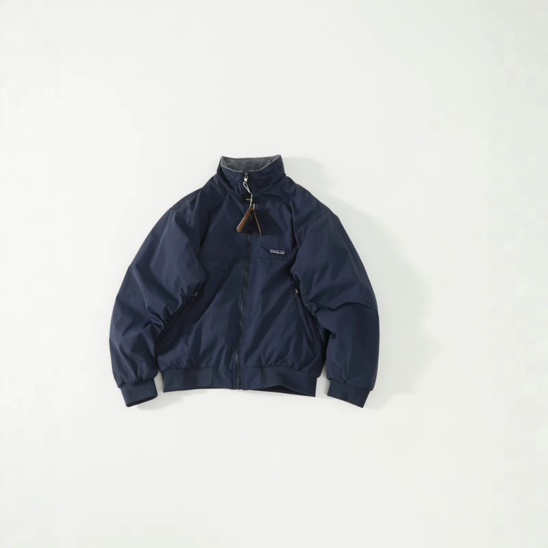 Pat JKT, a vintage-style, stand-up collar, fleece-lined flight jacket, is windproof, warm, and durable Pat JKT, a vintage-style, stand-up collar, fleece-lined flight jacket, is windproof, warm, and durable