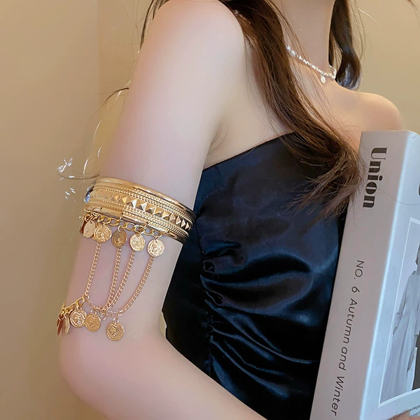 Golden bracelet with tassels
