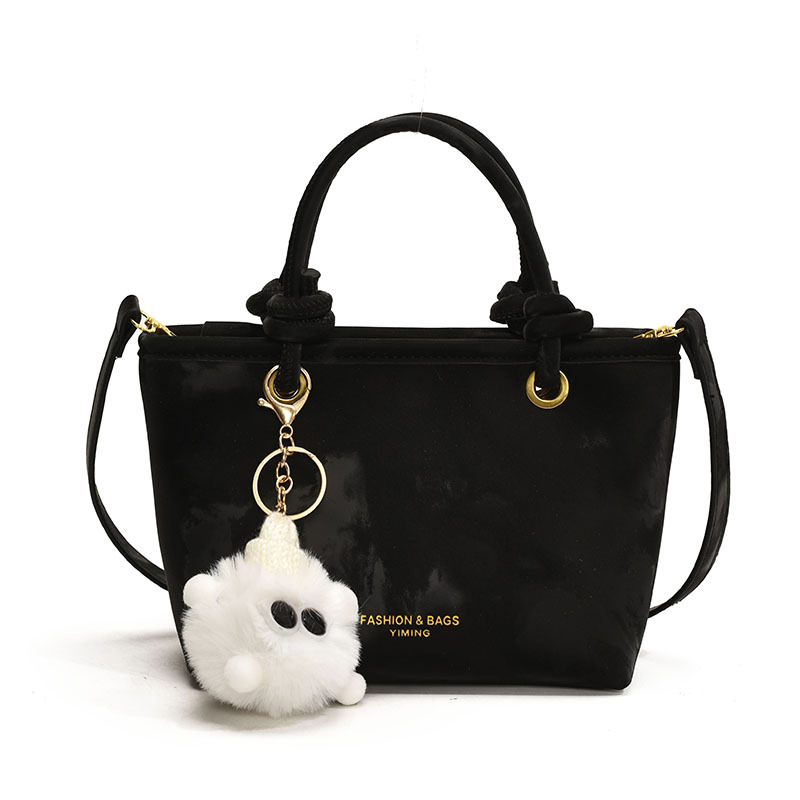 Bolso de mano casual simple coreano para damas 2025 nuevo estilo de transporte universal bolso de cubo popular mochila de hombro