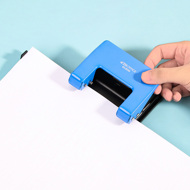 Suministros de oficina puncher de dos agujeros manual de hojas sueltas agujero redondo puncher poroso pequeño puncher papelería al por mayor