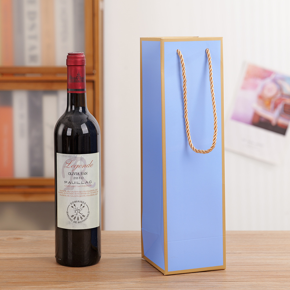 現物の高級ワインの手提げ袋は、シングルワインのギフト包装袋の紙袋を厚くしてロゴを印刷することができる