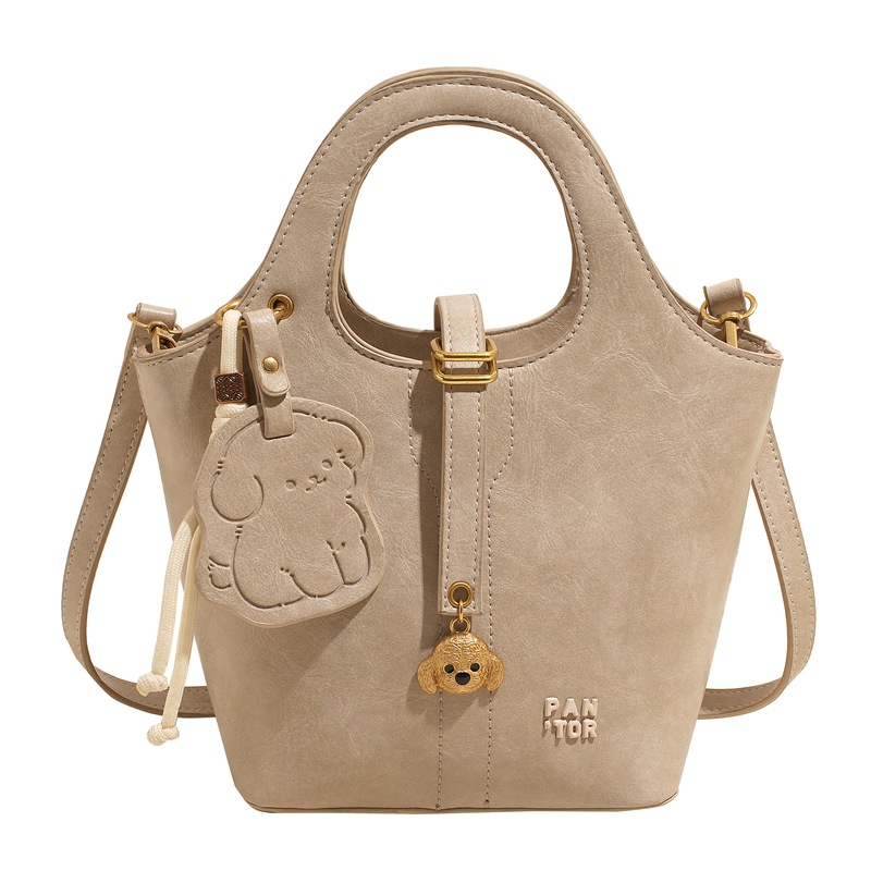 Moda coreana portátil bolso de cubo de agua para mujeres 2025 nuevo nicho simple bolso de hombro de alto nivel bolso de mochila versátil