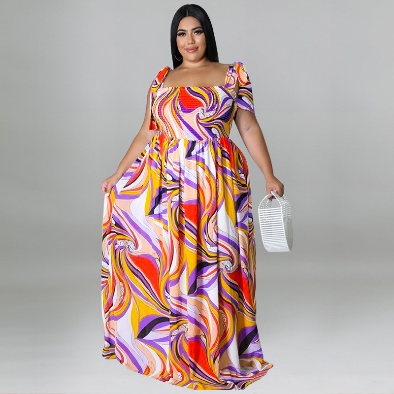 Maxi jurk met spaghettibandjes en smockwerk en strikprint_voghion.com