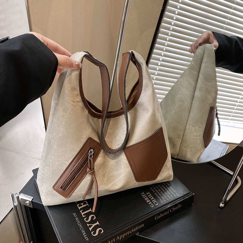 Bolsa de viaje multi-bolsillo 2025, primavera, nuevo retro versátil bolso de hombro de clase, bolsa de gran capacidad para mujeres