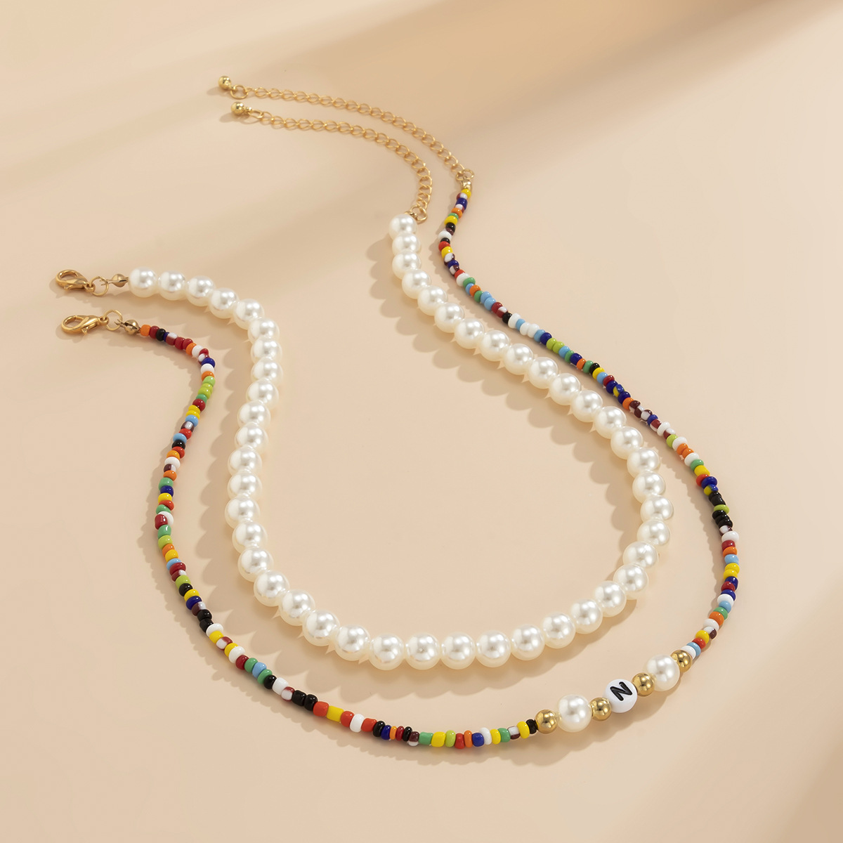 Cross-border Jewelry Mix And Match Rice Bead Woven Contrast Color Necklace Imitation Pearl Eye Letter Necklace display picture 5
