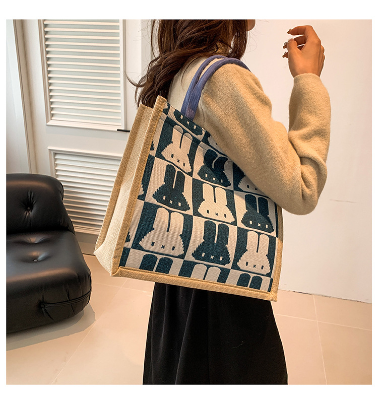 High-end mid-capacity canvas school commuting handbag 2024 new style fashionable and versatile linen single-shoulder tote bag undefined