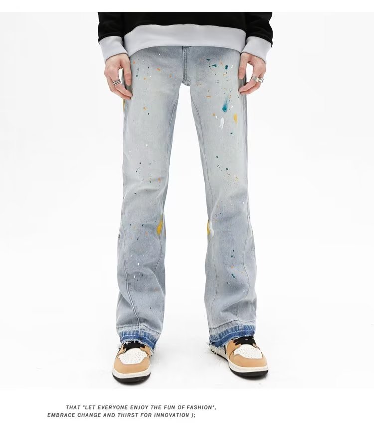 Jeans uomo slim fit stretch con strappi e taglio micro flare_voghion.com