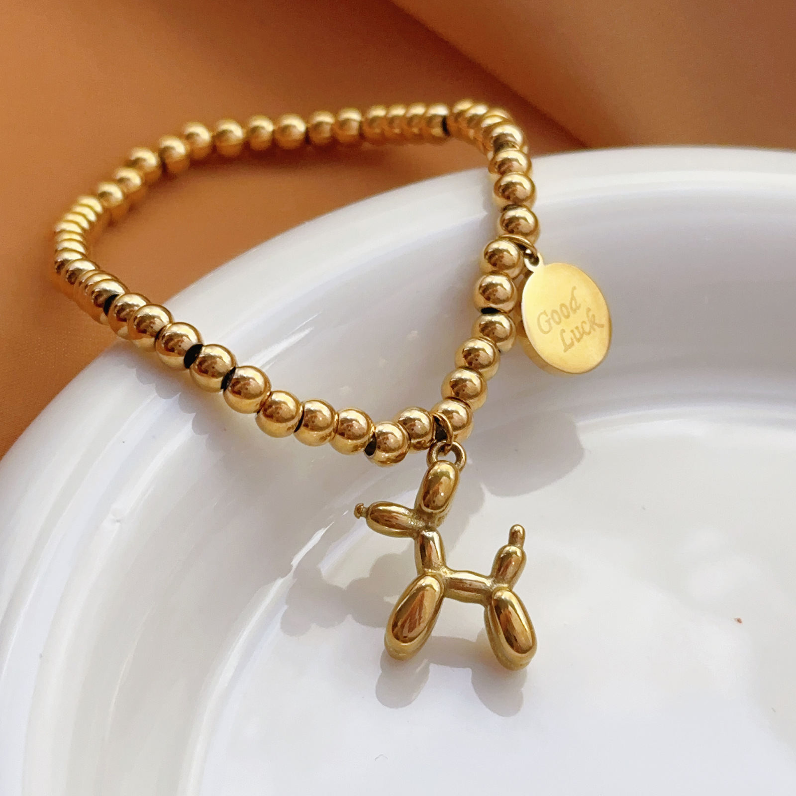Estilo coreano ins lindo aire cachorro pulsera collar salvaje mujer 18k oro transfronterizo titanio acero joyería no desvanece luz de lujo