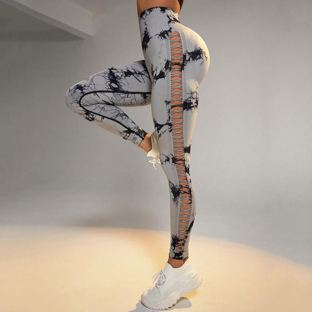 Transfronterizo de cintura alta hueco atado teñido de camisa de mel桃 hips fitness deportivo pantalones ajustados malla sexy ropa de yoga para mujeres