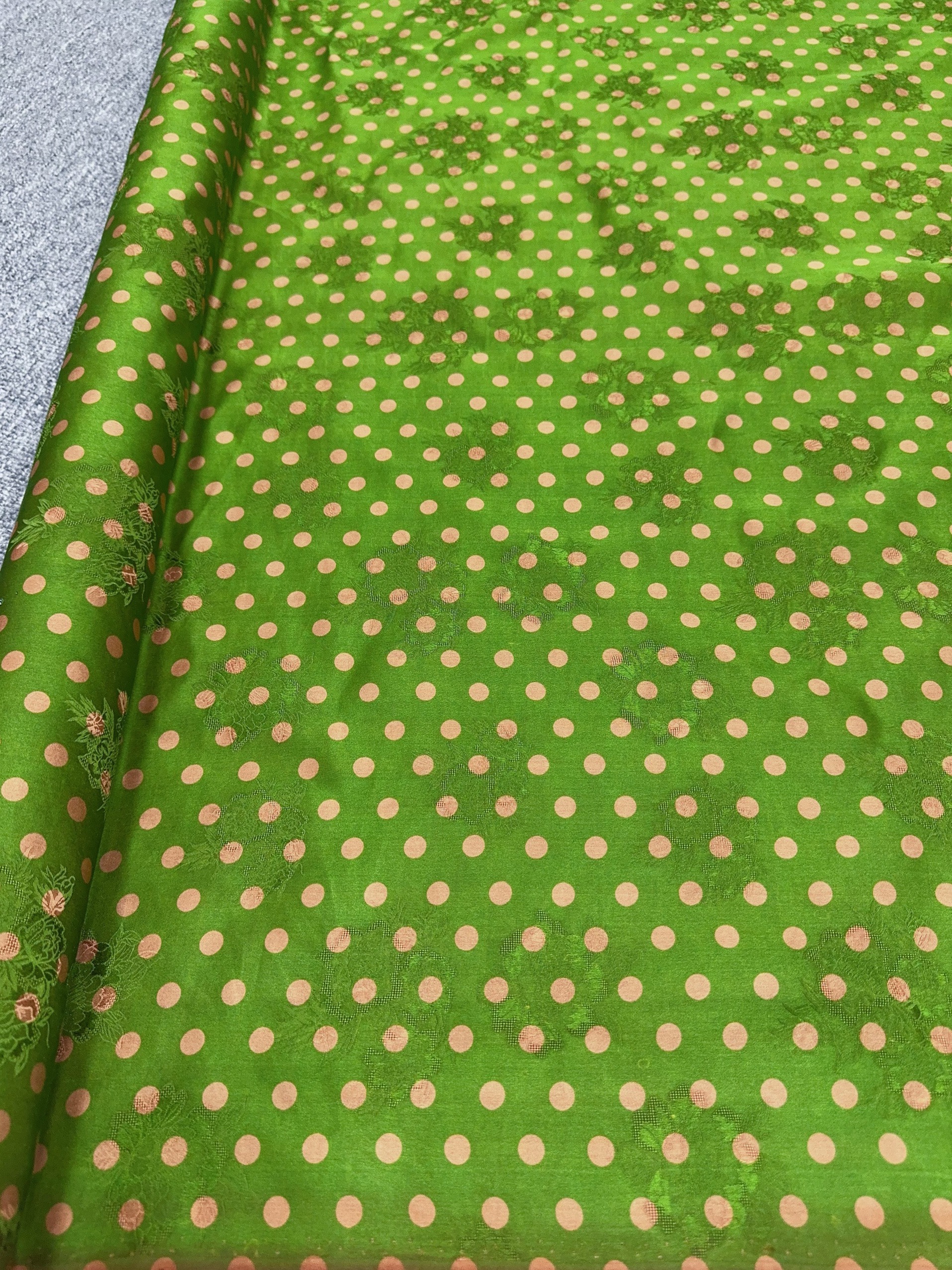 Green background polka dots*price per meter