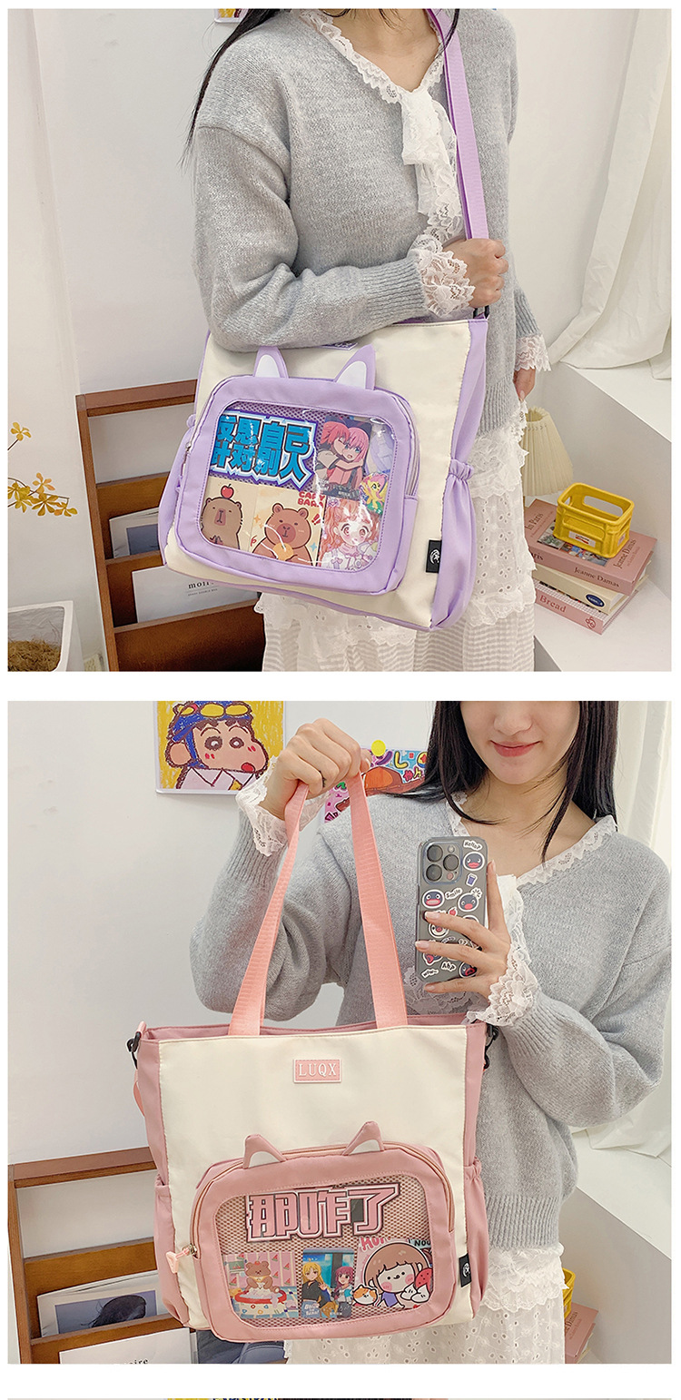 The new cute cartoon printed student bag with a large capacity and transparent student storage single-shoulder bag is selling well for women undefined