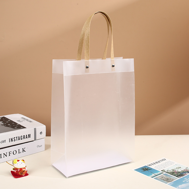 Bolsas de plástico regalo en stock PP poliescalada personalizada bolsas de mano transparentes de PVC logotipo personalizado