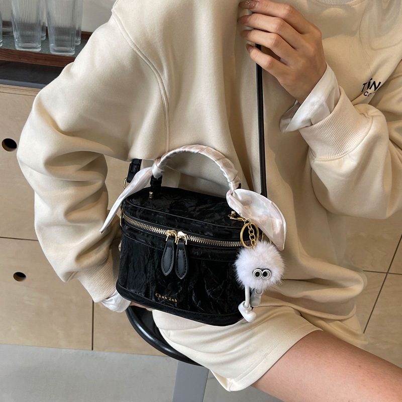 Bolsos versátiles sencillos de alta calidad para mujeres 2026 primavera y verano nuevo nicho bolso de cubo de diseño coreano bolso de hombro