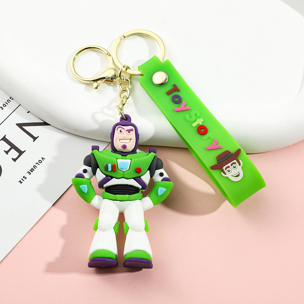 Llavero de silicona de Toy Story, el popular dibujo animado, con personajes como el alienígena de tres ojos, Buzz Lightyear y el oso Lotso, ideal como adorno para bolso.