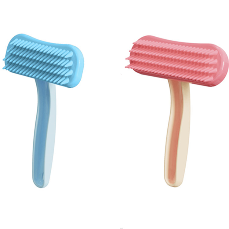 Fábrica al por mayor peine para mascotas perro gato peine de silicona masaje peine de dientes suaves peine de pelo flotante artefacto de depilación de conejo