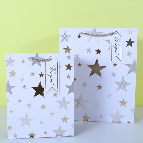 Hot gold white card gift packaging bag five-pointed star shopping bag Polish pattern series paper bag wholesale gift bag
