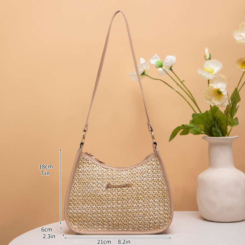 Fresco dulce 2025 nuevo bolso de paja de mujer, bolso de hombro de moda versátil, bolso de brazo de mujer nicho