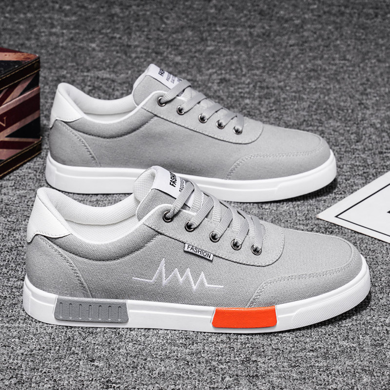 Zapatos de lona para hombres 2024 primavera zapatos de hombre nuevos zapatos casuales de hombre zapatos deportivos de altura baja tendencia versátil zapatos de plantilla