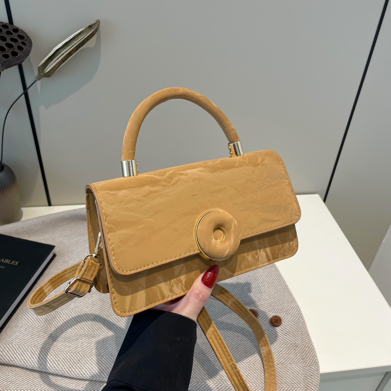 Textura de empalme artístico simple bolso cuadrado 2024 ocio nuevo estilo de invierno personalidad extranjera bolso de hombro portátil