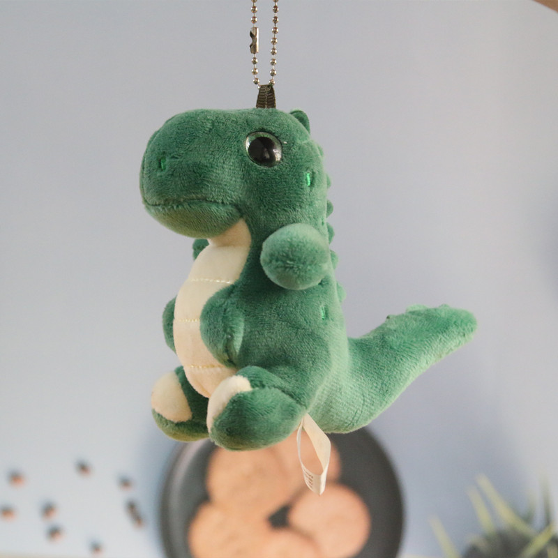 Pequeño dinosaurio muñeca de peluche llavero mochila colgante lindo Tyrannosaurus muñeca pareja mochila accesorios colgantes moda