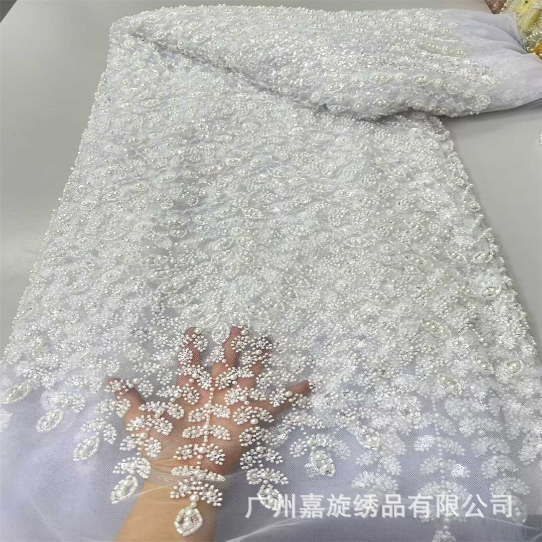 Nuevos vestidos de boda de cuentas hechos a mano de Europa y América Tejido de encaje vestidos de boda Tejido de encaje