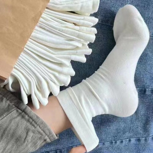 Socks for women ins fashion versatile solid color confinement socks spring and autumn versatile boneless socks simple style pile socks Japanese white