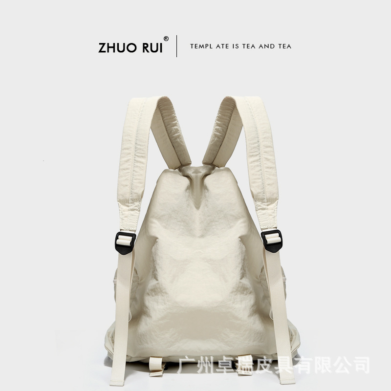 Corea del Sur Dongdaemun nuevo cordón mochila mujer casual gran capacidad estudiante mochila versátil mochila de nylon ligero