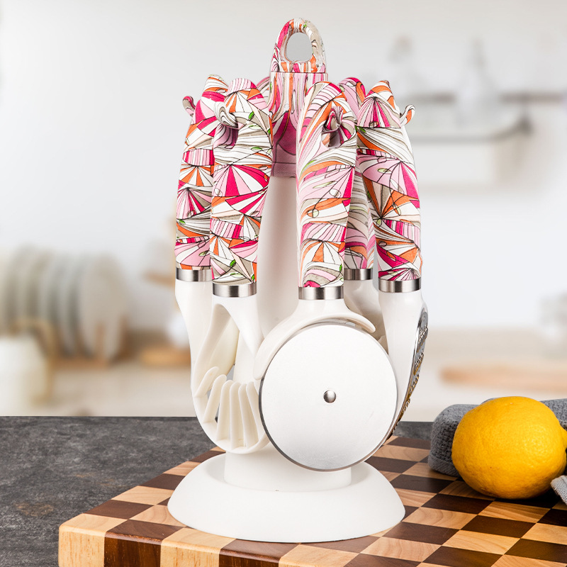 Juego de utensilios de cocina con mango de ABS, incluye estante de almacenamiento, cortador de melón, cortador de pizza, cuchara para helado, abridor de botellas, rallador, práctico.