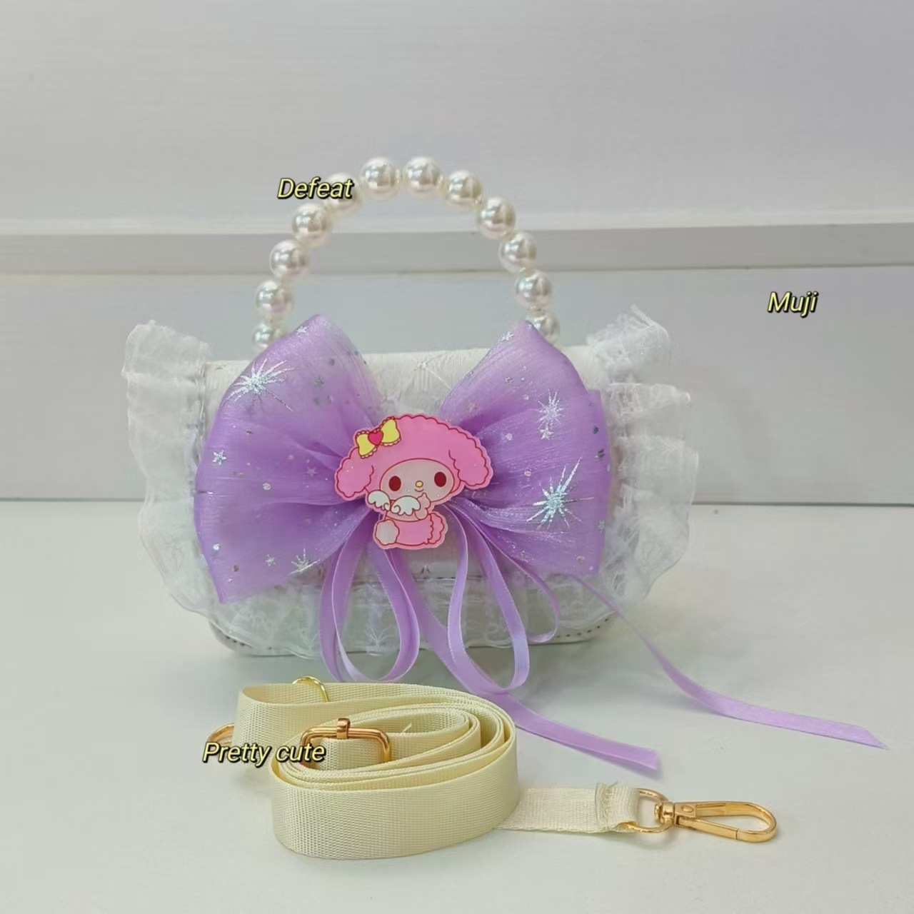 Bolso de arco para niños bolso de perlas bolso de hombro bolso de cambio bolso de accesorios bolso de dibujos animados Melody bolso de princesa