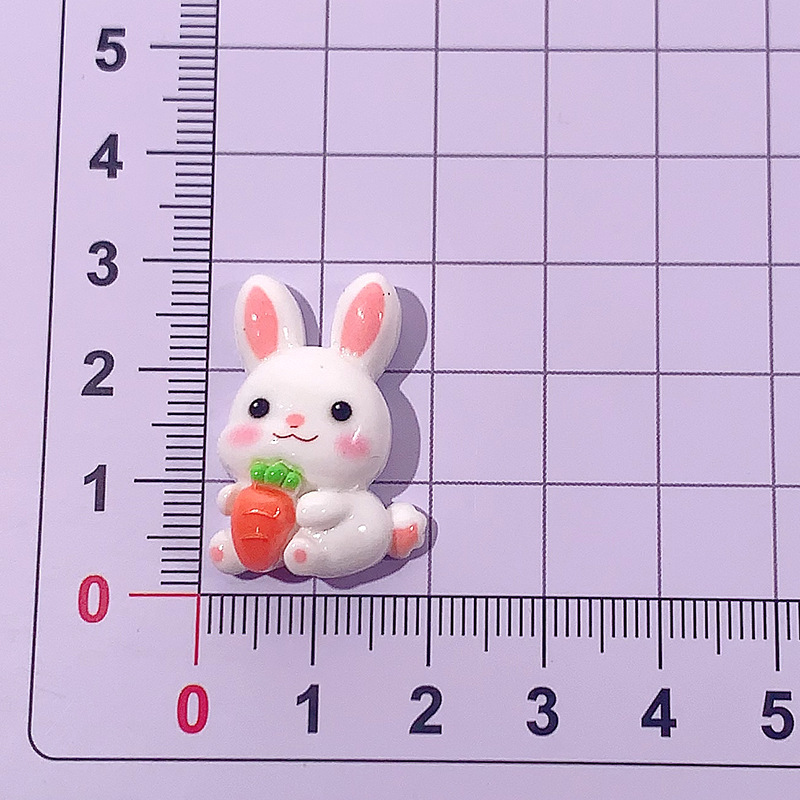 Conejo de zanahoria sentado en el suelo