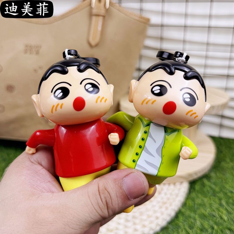 爆発的な創造的なアニメランニングのしんちゃんがかわいい線を引いた学生カップルのアニメの鍵玩具ストラップが解凍された|undefined