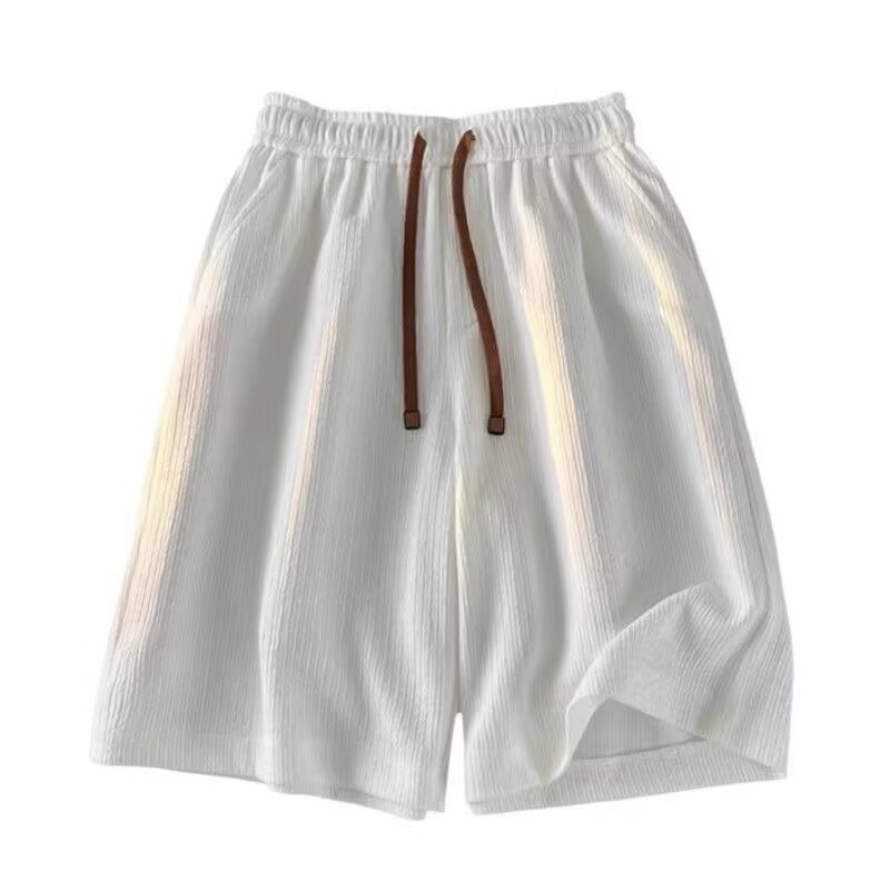 Pantalones cortos de seda de hielo de tamaño grande de textura de verano de moda para hombres. Pantalones medianos sueltos. Pantalones deportivos casuales de cinco puntos.