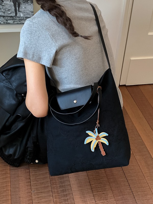 Bolso de mujer 2026 nuevo estilo coreano tela de gran capacidad bolso de mano de viaje simple diario mochila de hombro