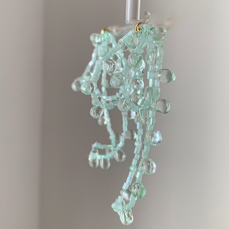 Pendientes de borla de flores de tela de aguja de plata Pendientes de estilo de vacaciones junto al mar