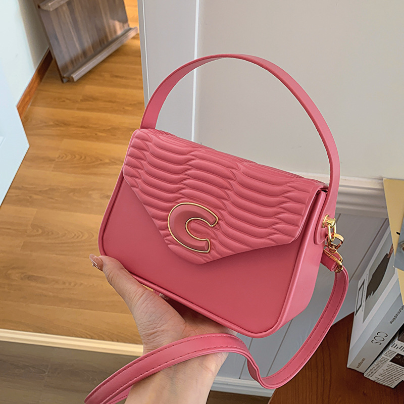 Liten firkantet bag 2024 tidlig på våren ny stil skulder bærbar crossbody preget stor kapasitet mote fabrikk varer engros utenrikshandel kryss_voghion.com