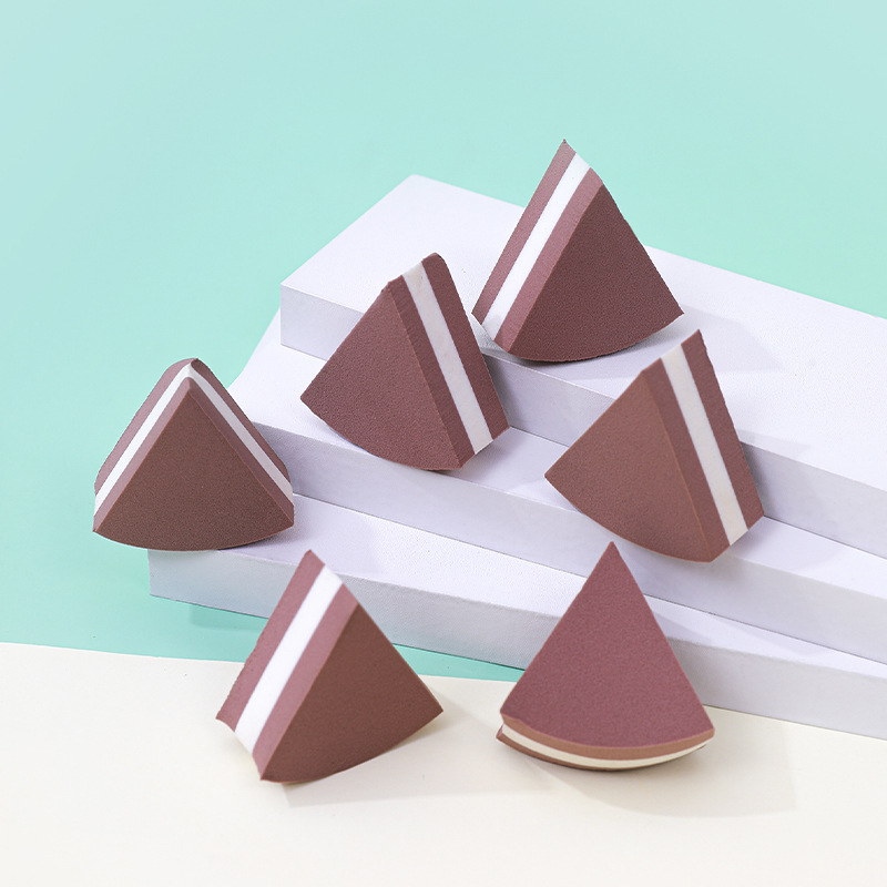 Fábrica personalizada pequeño triángulo redondo seis cortes en forma de ventilador polvo seco húmedo de doble uso no látex esponja de maquillaje almohadilla de aire huevo de maquillaje de belleza