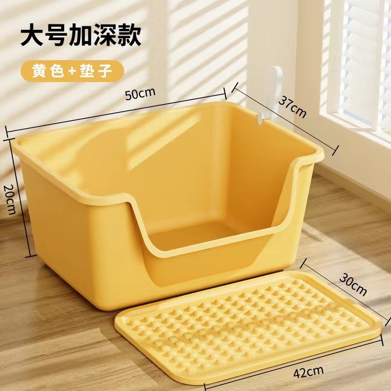 Almohadilla amarilla grande con arena para gatos