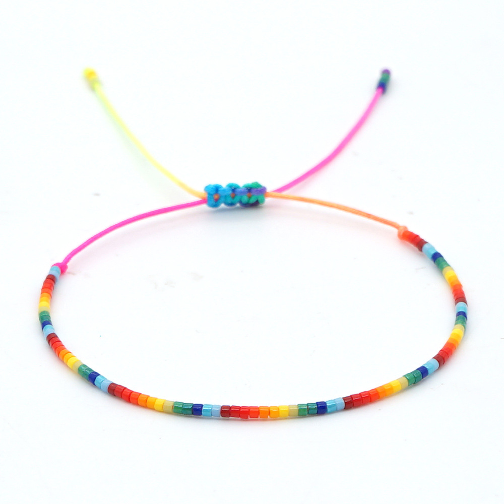 Fashion Bohemian Spring And Summer Rainbow Beaded Daisy Flowers Stacked Bracelet display picture 3