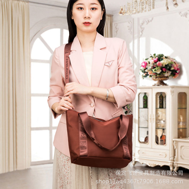 2024 primavera nueva moda simple todo fósforo Oxford tela impermeable sólido leopardo hombro crossbody moda