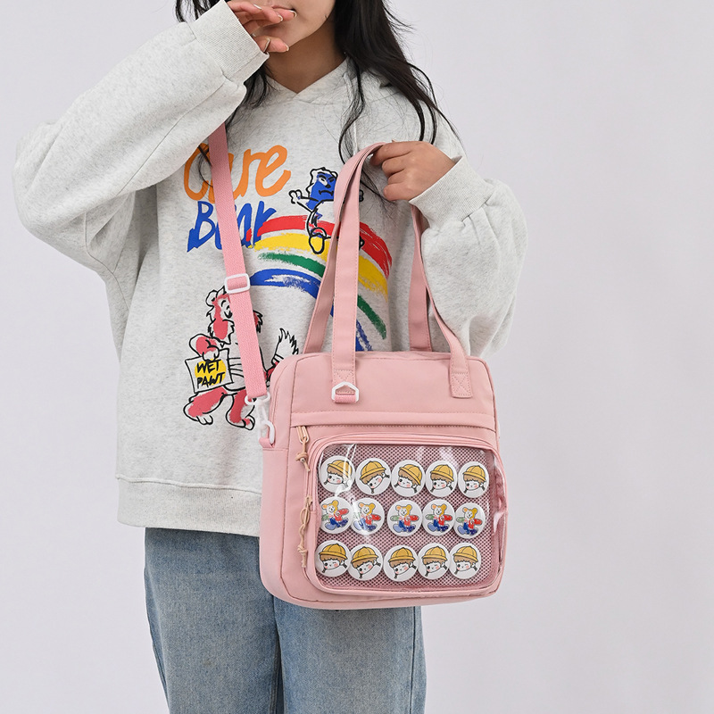 日韩简约动漫周边创意徽章小号痛包帆布个性带扎板学生透明斜挎包