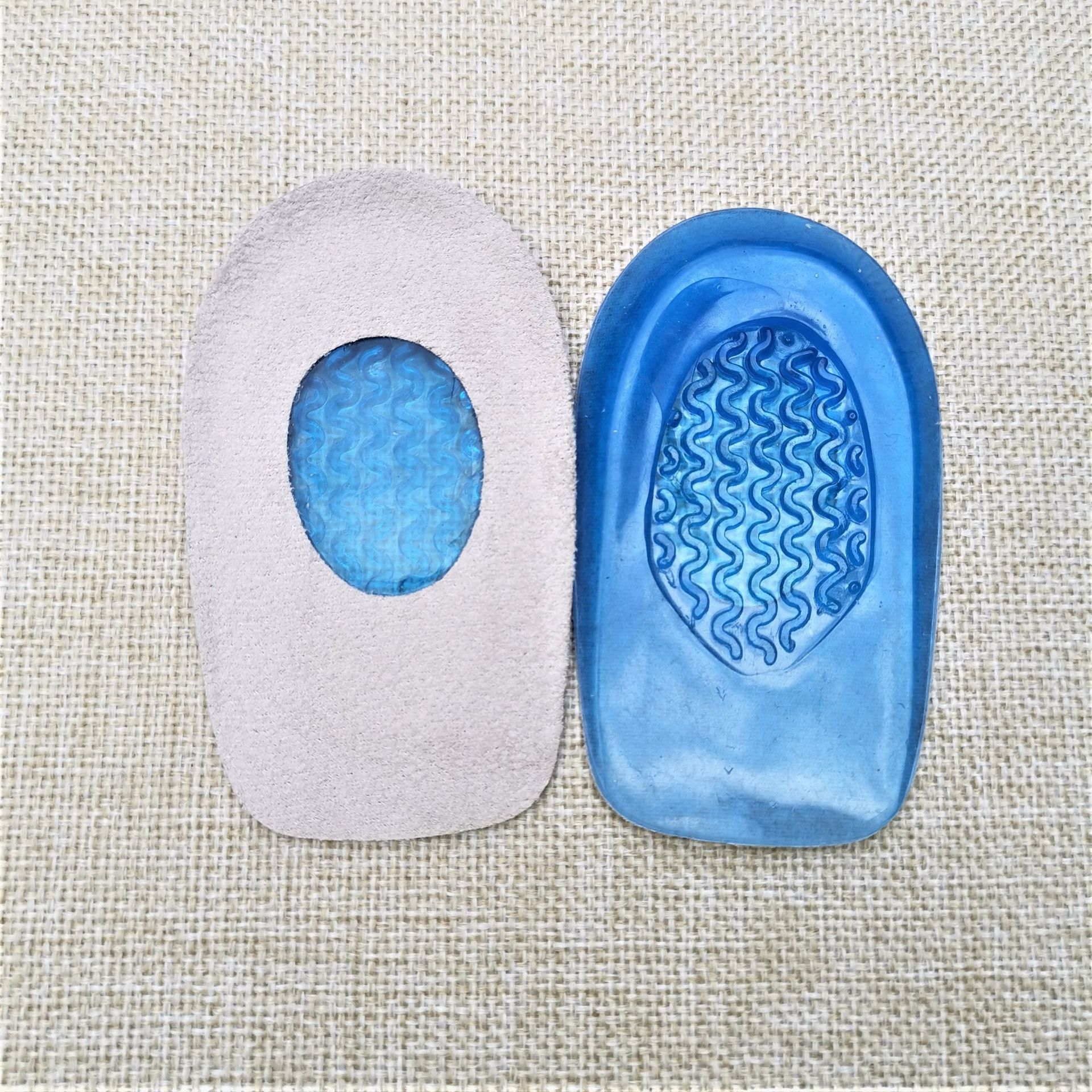 Almohadilla de talón de silicona que aumenta la altura absorbente de sudor transpirable absorbente de golpes antidesgaste corrección del pie taza del talón al por mayor