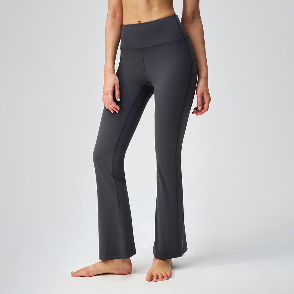 Microplaneta de cintura alta desnuda elástica pilates elástica pantalones deportivos para mujeres