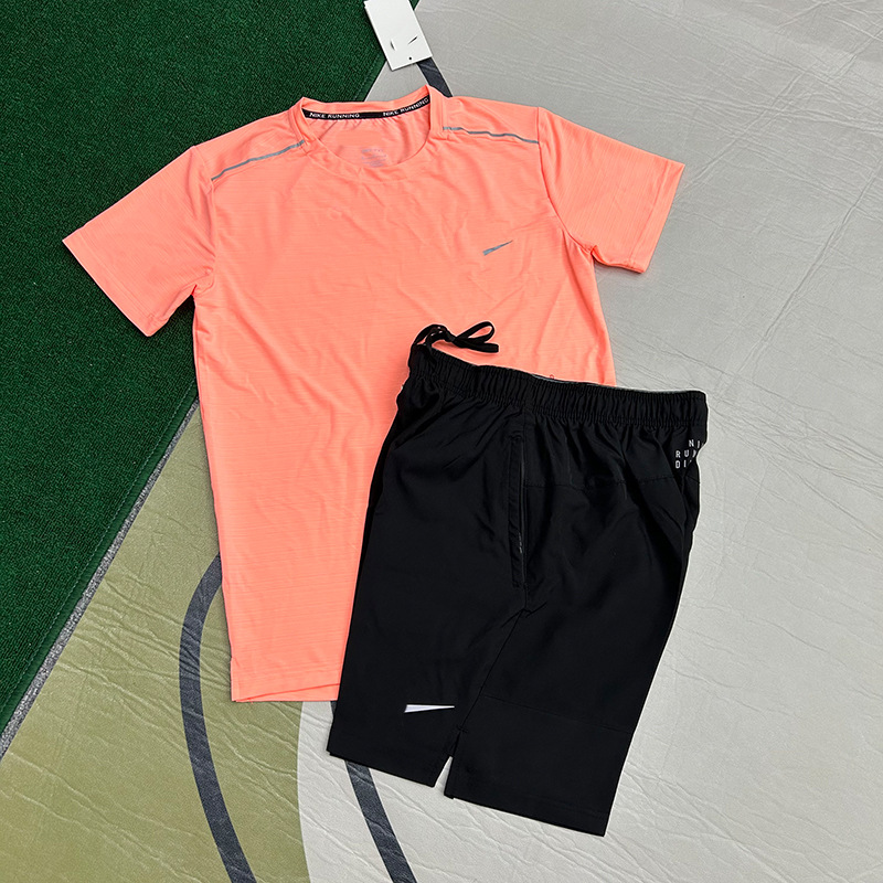 Mayorista nuevo juego de comercio exterior deportivo fitness juego de carrera rápida secado transpirable suelto ocio pantalones cortos de manga corta ropa de hombre