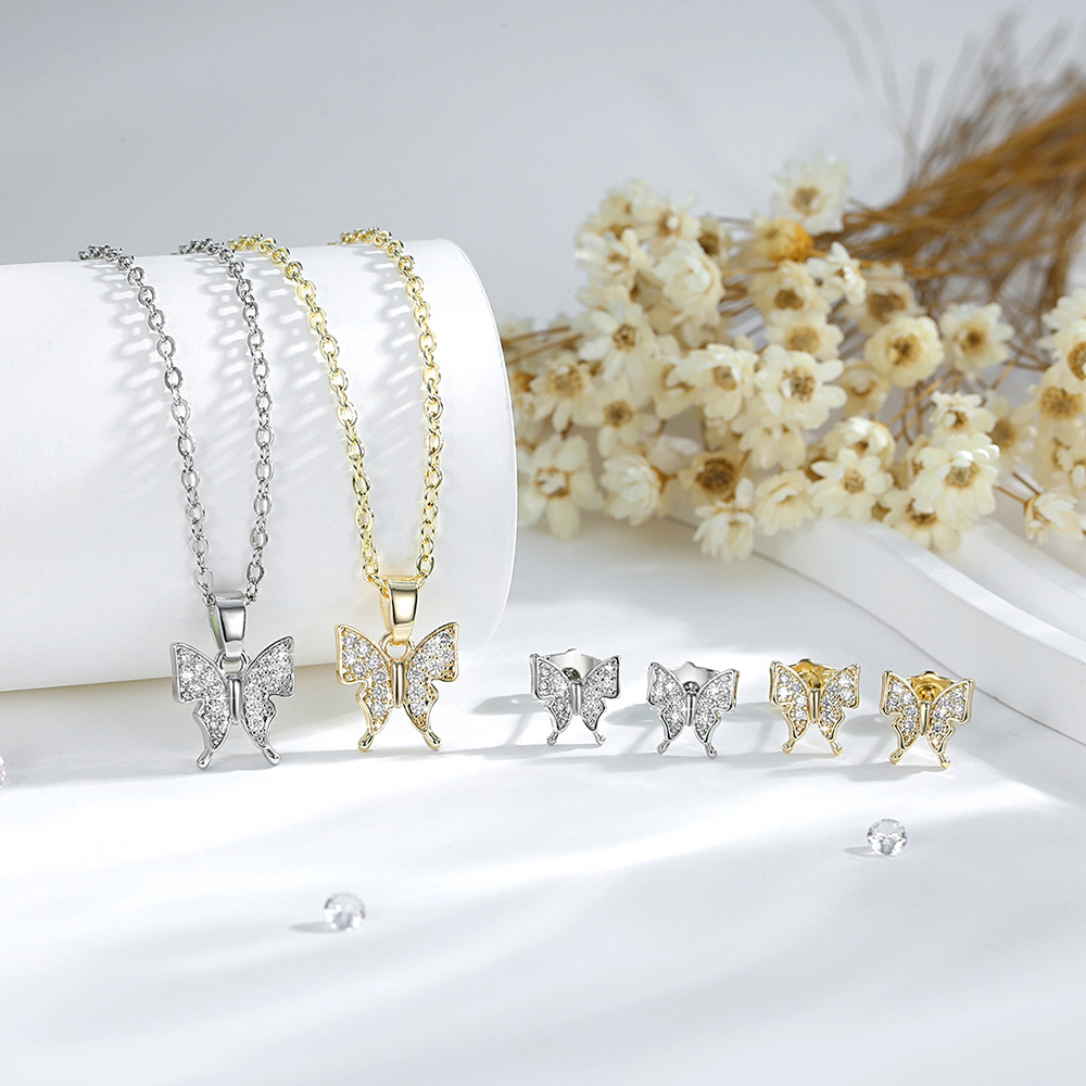 Transfronterizos diamantes mariposa pendientes collar conjunto de moda o cadena temperamento mariposa colgante joyas chapadas en oro de cobre