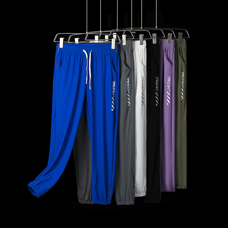 Transmisión en vivo Nueva Cola de seda de hielo pareja Pantalones deportivos drapeado suelto versátil delgado de secado rápido hombres y mujeres de los mismos pantalones Casuales