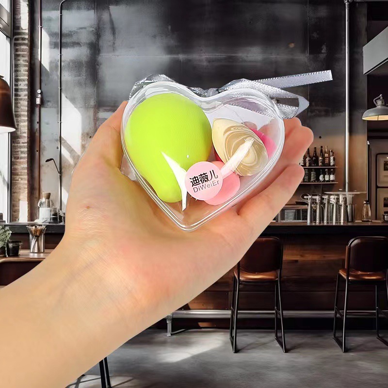 El amor de los huevos de maquillaje no comer polvo, polvo seco y húmedo, maquillaje con un pequeño conjunto de polvo de maquillaje de huevos de color al por mayor.